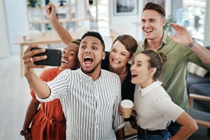 Group of young adult friends taking a selfie