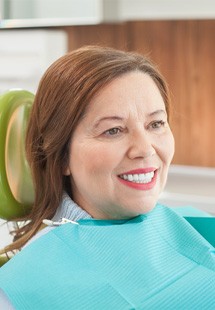 Woman smiling in the dental chair