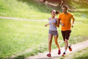 Fit couple jogging outside